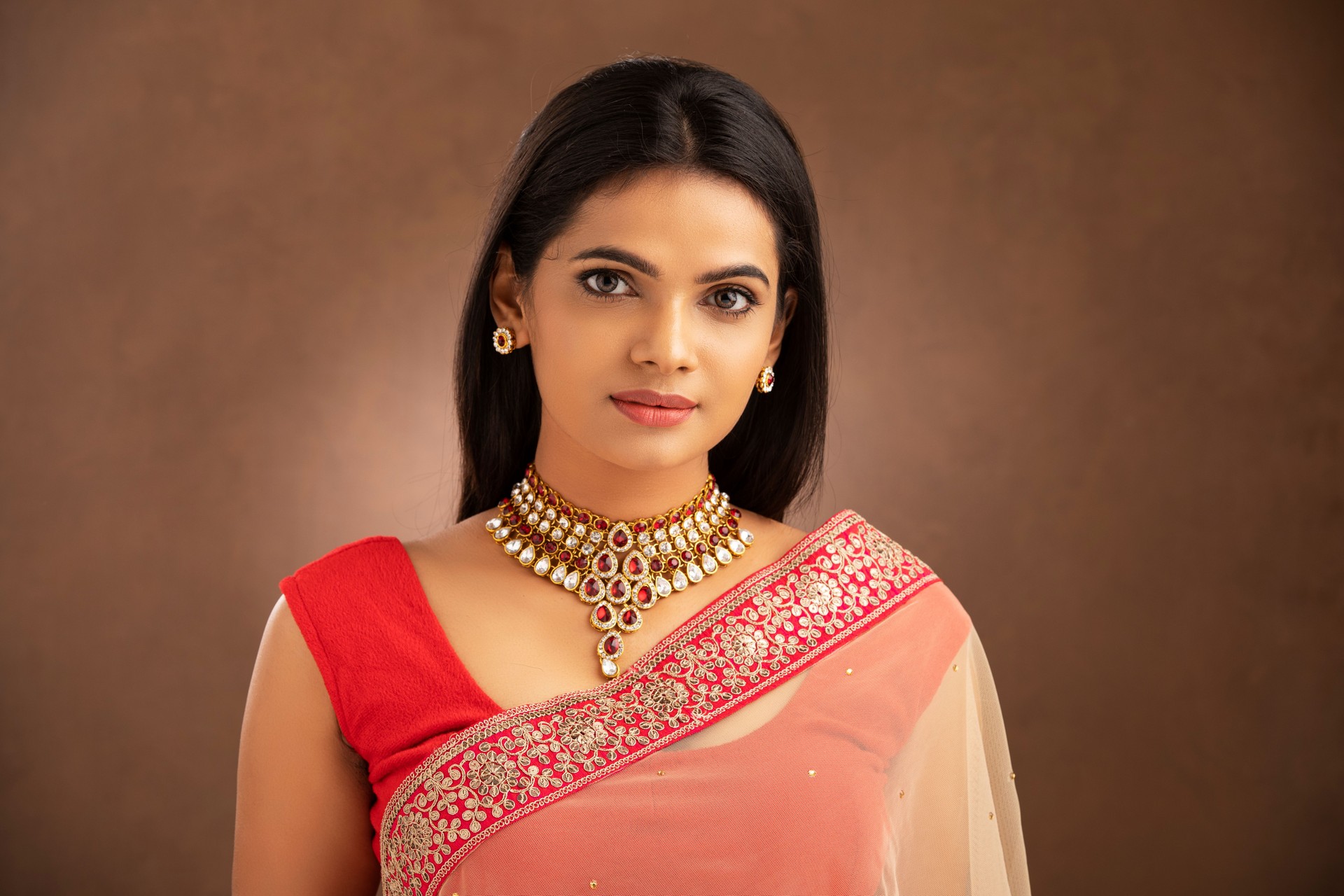 Pretty Indian young Hindu girl dress up for festival.