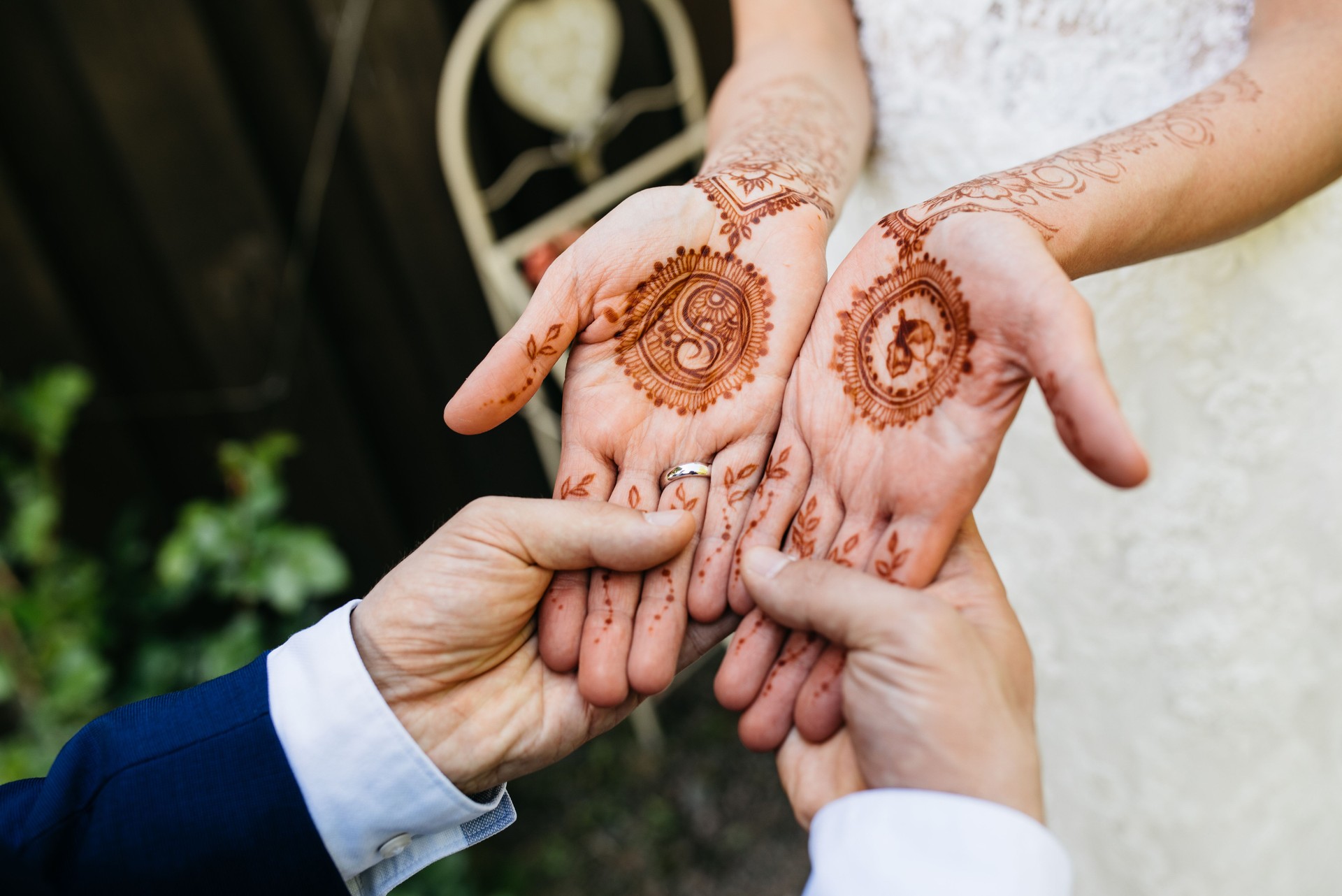 Bride Showing Traditional Henna Mehndi Palm Designs During Wedding Ceremony
